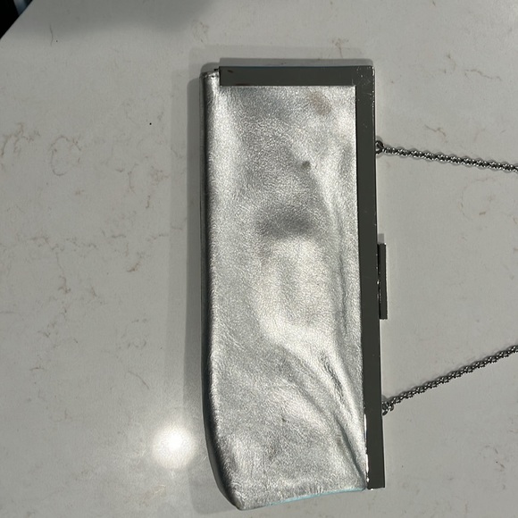 Calvin Klein silver vintage clutch purse with chain strap. - Picture 8 of 9